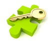 Golden key of success on green puzzle piece