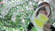 Girl washing window closeup