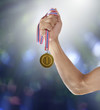 Hand And Gold Mmedal