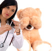 young doctor with stethoscope and syringe