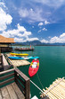 various color Kayak in front of raff on Khao Sok Lake, Thailand
