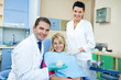 Dentist showing dental mold