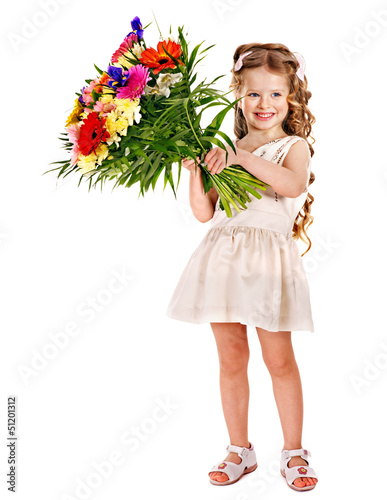 Photo: Child with spring flower. Child with spring flower.