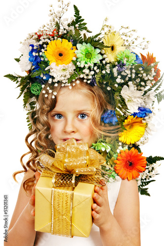 Photo: Child with gift box and flower. Child with gift box and flower.
