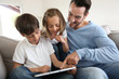 Family websurfing on internet with tablet