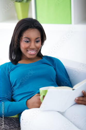 Photo: black woman reading book black woman reading book