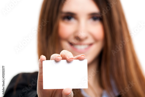 Photo: Business woman holding a blank card Business woman holding a blank card