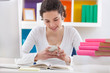 Photo: Teenager student typing message Teenager student typing message