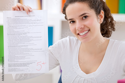 Photo: Schoolgirl with her test Schoolgirl with her test