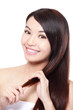 young woman happy touch her hair