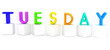 3d letter is colorful with white cubes "Tuesday"