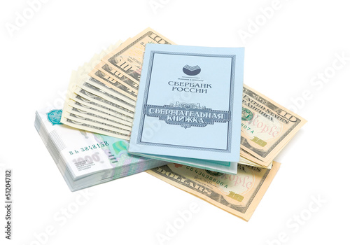 Photo: Savings book, Russian rubles and U.S. dollars. Savings book, Russian rubles and U.S. dollars.