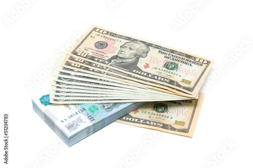 Photo: U.S. dollars and Russian rubles on a white background U.S. dollars and Russian rubles on a white background