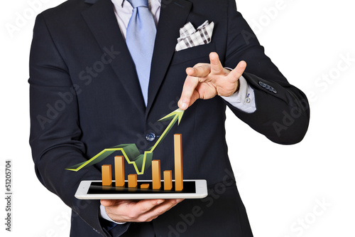 Photo: business man which extracts bar graphs business man which extracts bar graphs