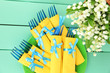 Blue plastic forks wrapped in yellow paper napkins,