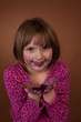 Kid with blueberries on face