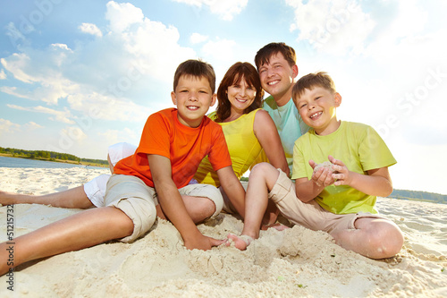 Photo: Sitting on sand Sitting on sand