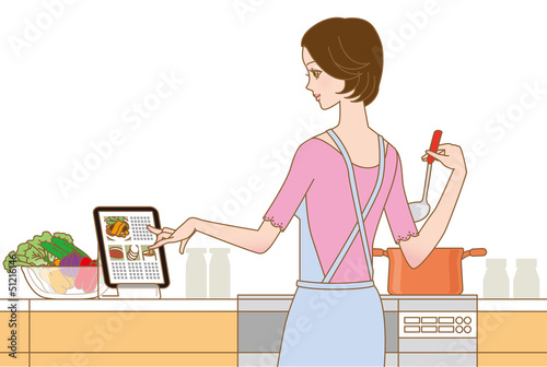 Illustration: 料理する女性 タブレットでレシピ確認 料理する女性 タブレットでレシピ確認