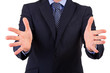 Businessman gesturing with both hands.