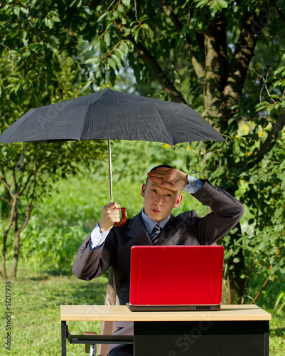 Photo: Businessman Working Outdoors Businessman Working Outdoors