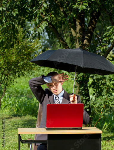 Photo: Businessman Working Outdoors Businessman Working Outdoors
