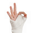 Broken arm in a cast. Fingers show the character all is well - O
