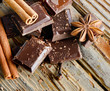 Broken chocolate bar and spices