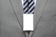 Blank name tag on suit