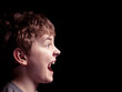Profile of the shouting boy