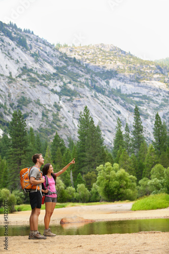 Photo: Hiking people on hike in mountains in Yosemite Hiking people on hike in mountains in Yosemite