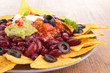 plate of nachos with guacamole