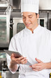 Chef Using Digital Tablet