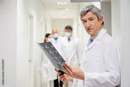 Photo: Radiologist Holding X-ray Radiologist Holding X-ray