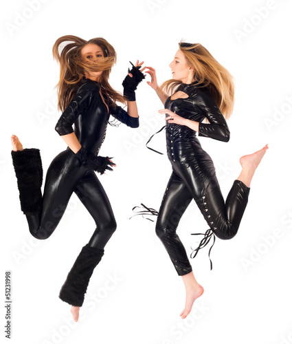 Photo: Two pretty girls jumping Two pretty girls jumping