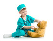 Photo: boy kid playing doctor with plush toy boy kid playing doctor with plush toy