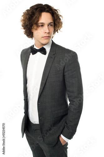 Photo: Handsome young bridegroom looking away Handsome young bridegroom looking away