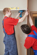 Photo: Wardrobe joiners at installation work Wardrobe joiners at installation work