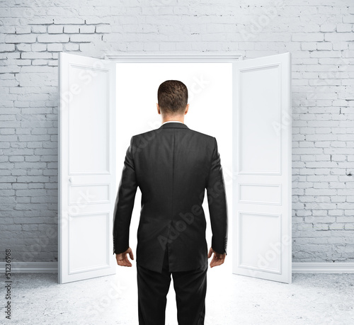 Photo: man and open door man and open door