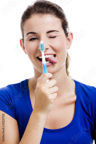 Photo: Beautiful woman with a toothbrush Beautiful woman with a toothbrush