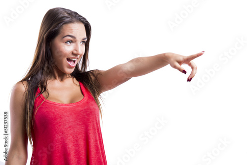 Photo: Beautiful woman pointing to something Beautiful woman pointing to something