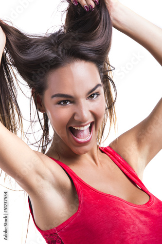Photo: Woman grabbing her hair Woman grabbing her hair