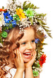 Child with gift box and flower.