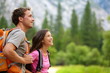 Couple - active hikers hiking in Yosemite