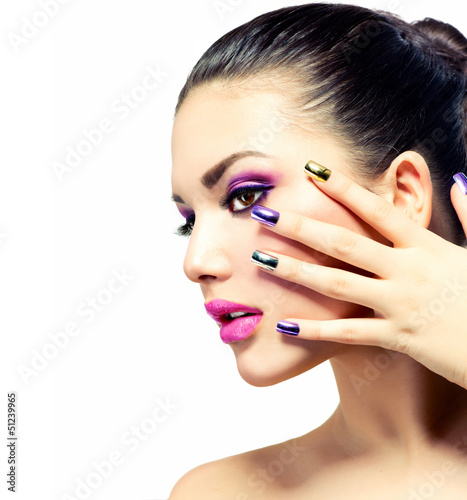 Photo: Beauty Makeup. Purple Make-up and Colorful Bright Nails Beauty Makeup. Purple Make-up and Colorful Bright Nails