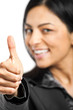 Portrait of beautiful girl showing OK sign and smiling