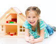girl with a toy house