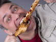 Starving meat-eating man, voracious expression of his face