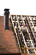 Carpenter working on the roof