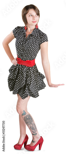 Photo: Woman in Dress with Tattoo Woman in Dress with Tattoo