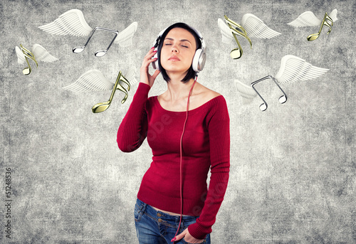 Photo: Girl with earphones Girl with earphones